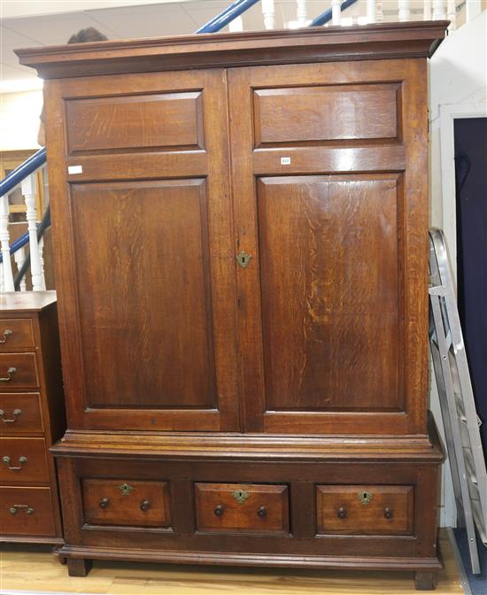 A mid 18th century Dutch oak cupboard, H.205cm